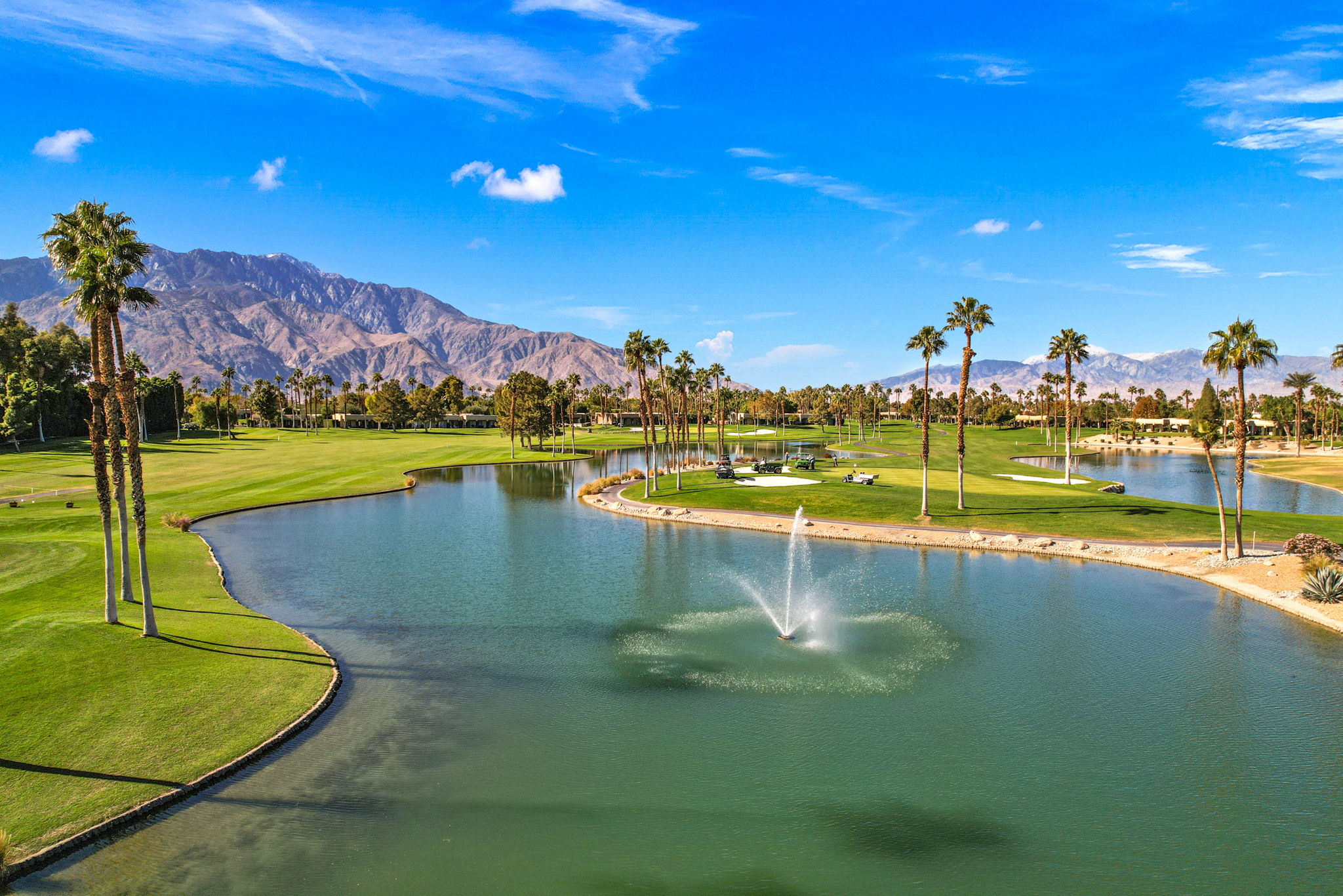 Pond with fountain on golf course