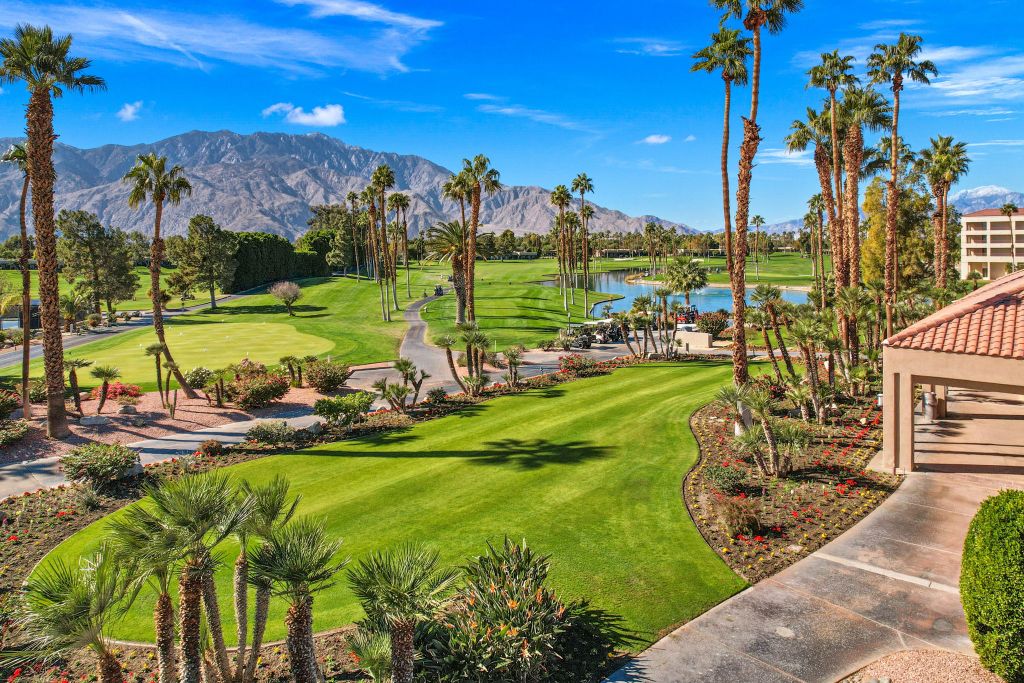 Golf course view with mountains in distance